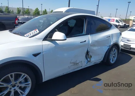 2022 Tesla Model Y Long Range Dual Motor All-Wheel Drive from USA, damaged, VIN 7SAYGAEE2NF365977